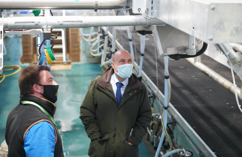 Andrew Griffith MP and Farm Manager Alex Hollands in Brinsbury College’s milking parlour.