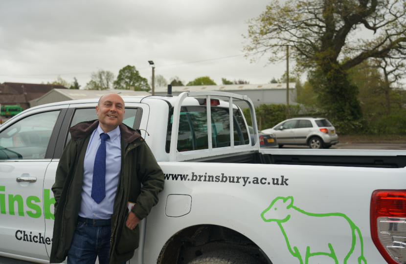 Andrew Griffith MP next to Brinsbury’s branded 4x4 vehicle, promoting www.brinsbury.ac.uk