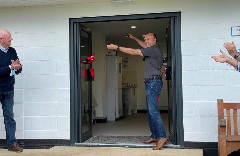 Andrew cutting the ribbon to the new Southdown Gliding Club classroom extension.