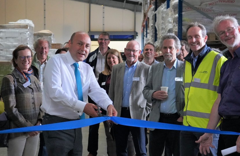 Andrew cutting the ribbon for Hepworth’s new smart tech lower-carbon warehouse.