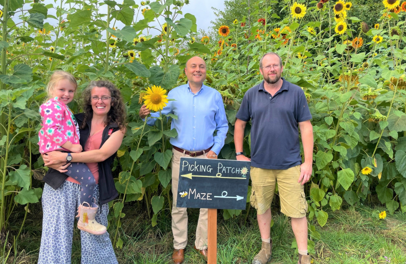 Andrew with Lisa, Maggie and Will Tupper at Bignor Sunflower Maze and picking patch