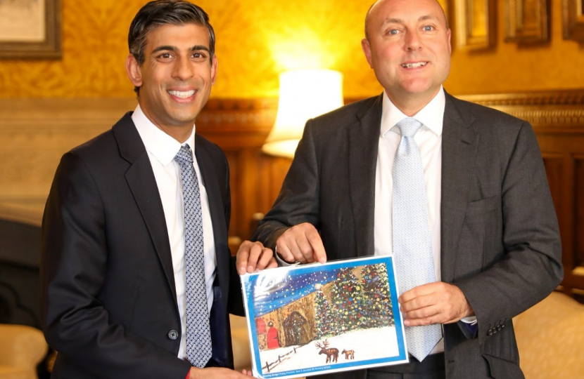 Andrew Griffith with PM Rishi Sunak and winning Christmas Card design