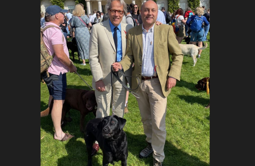 The Duke of Richmond with Andrew Griffith and his labrador