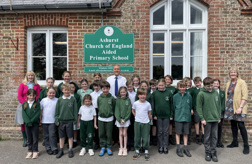 Andrew with headteacher Sarah Smith (far left) and children of Ashurst CofE Primary School