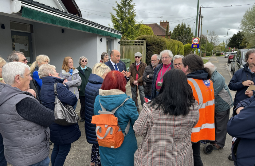 Andrew Griffith speaking to residents in Sayers Common about sewage issues