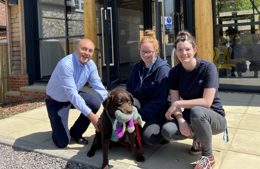 Andrew pictured with Bliss the Chocolate Lab, Sarah Carden and Susan Botherway.