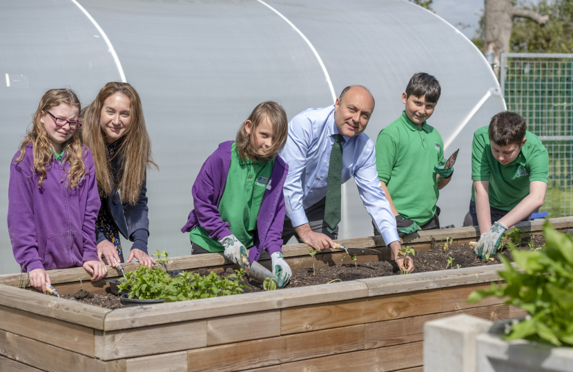 Andrew with Jen Weeks, Principal, and students at LVS Hassocks