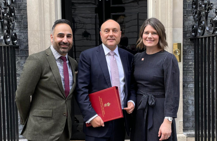 2.	Photo of Andrew Griffith MP welcoming Dementia Mission co-chairs, Hilary Evans and Nadeem Sarwar to 10 Downing Street