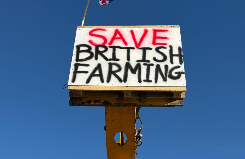 Farmers' message aloft a telehandler in Pulborough