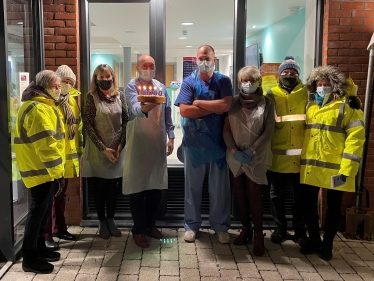 Andrew with The Glebe celebrating 10,000 vaccinations