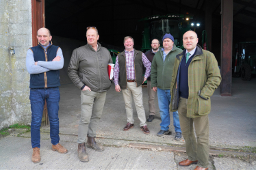 Andrew with farmers (library image)