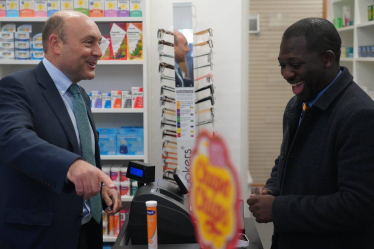 Andrew Griffith with Martin Chisanga at the official opening of The Arundel Pharmacy