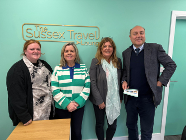 1.	Andrew with (L-R) Hannah Stoner, Edwina Coppock and Tanya Pace (owner) at The Sussex Travel Lounge in Storrington. 