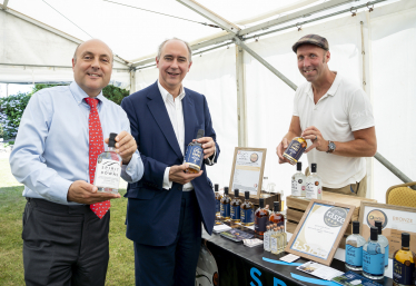 Andrew Griffith with Trade Minister Lord Johnson and Michael Yeoman, founder of Spirit of the Downs 