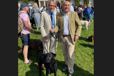 The Duke of Richmond with Andrew Griffith and his labrador