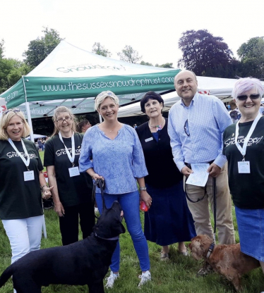 Photograph- from left: volunteers, Claire Parsons, Carolyn Coles, Mrs Griffith, Di Levantine - Chairman and Co - Founder of The Sussex Snowdrop Trust, Andrew Griffith and Mary Lewis.