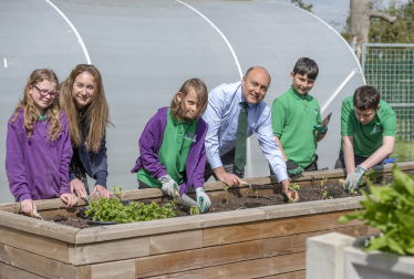 Andrew with Jen Weeks, Principal, and students at LVS Hassocks